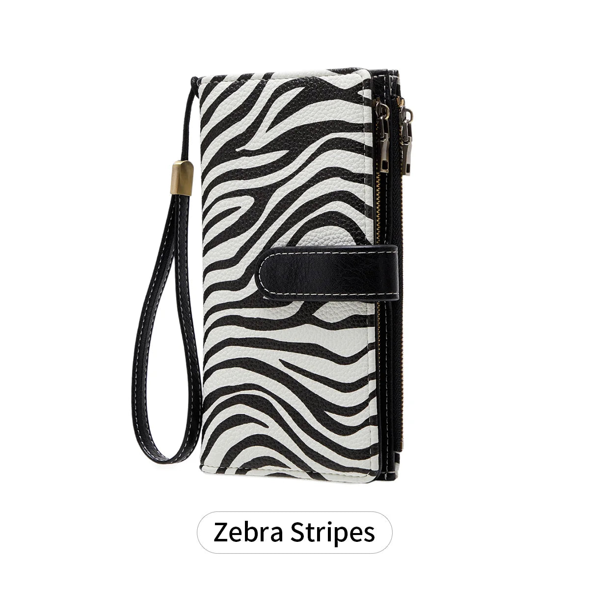 A black and white zebra stripe trifold clutch wallet with a gold-toned strap.