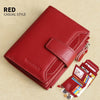 A red casual style leather wallet shown open with cards inside