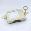 A beige loungefly zipper wallet with a square clear window and a brown patterned flap.