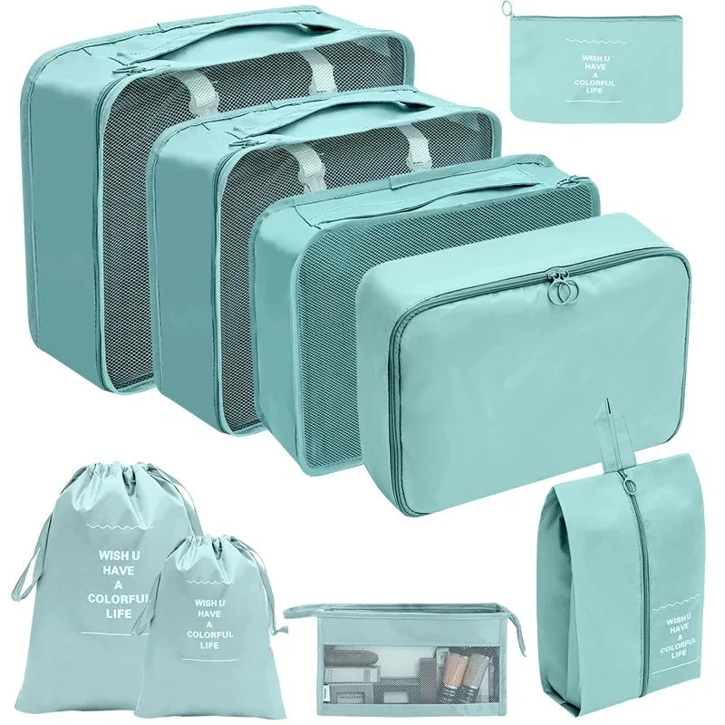 A set of teal fabric storage organizers and pouches for organizing various items.