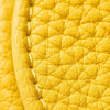 Close-up of a yellow fruit-shaped PU leather coin purse keychain with visible stitching.