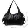 Sac cabas en cuir noir à plusieurs poches, vue de face.