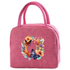 A pink insulated canvas lunch bag featuring a floral wreath design.