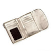 A silver metallic leather card holder wallet with a black card slot and a textured finish.