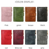 A display of women's minimalist triple layer card holder wallets in various colors including pink, green, brown, black, red, 