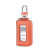 A small orange leather car key case with a transparent window and silver clasp.