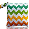 A reusable waterproof snack bag with a zipper closure featuring a chevron pattern in green, white, and orange.