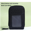 A black multi card wallet with a clear window is shown against a light green background.