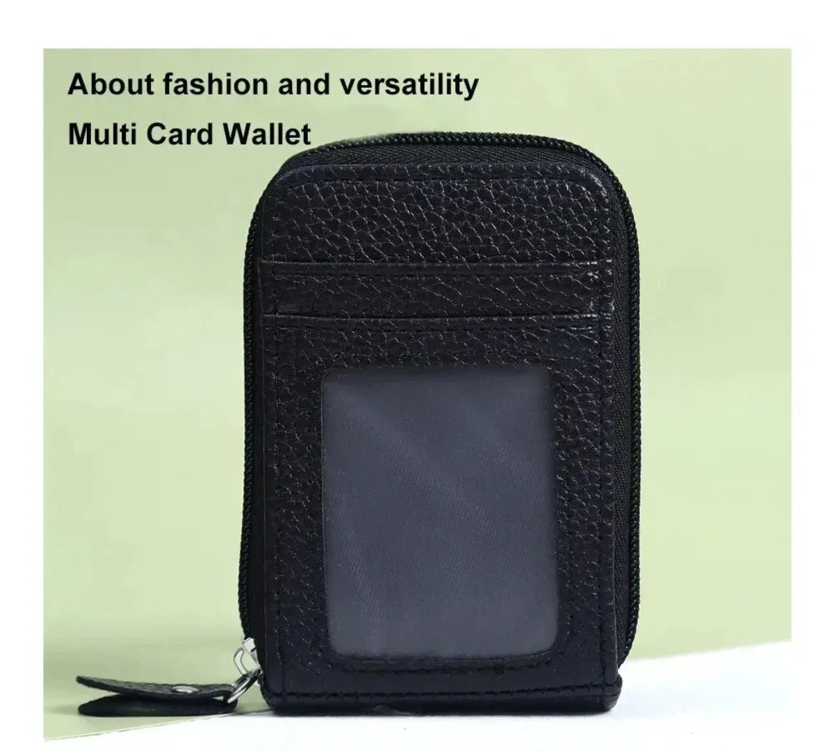 A black multi card wallet with a clear window is shown against a light green background.