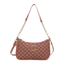 Sac bandoulière vintage en or lettre M de couleur rose poussiéreux.