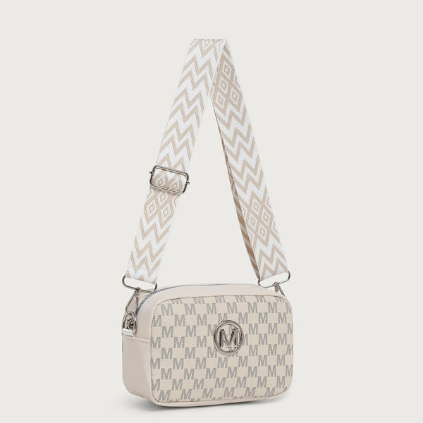 A beige patterned crossbody bag featuring a chevron print and a smooth leather strap.
