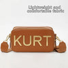 A brown leather pouch bag with the name KURT embossed on the front, shown against a white background.