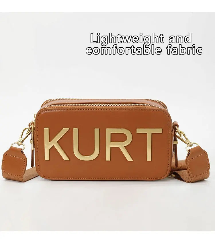 A brown leather pouch bag with the name KURT embossed on the front, shown against a white background.