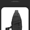 A black lightweight nylon crossbody sling bag shown from the front.