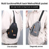 A black and gray multi functional bag shown in one-shoulder and diagonally across configurations.