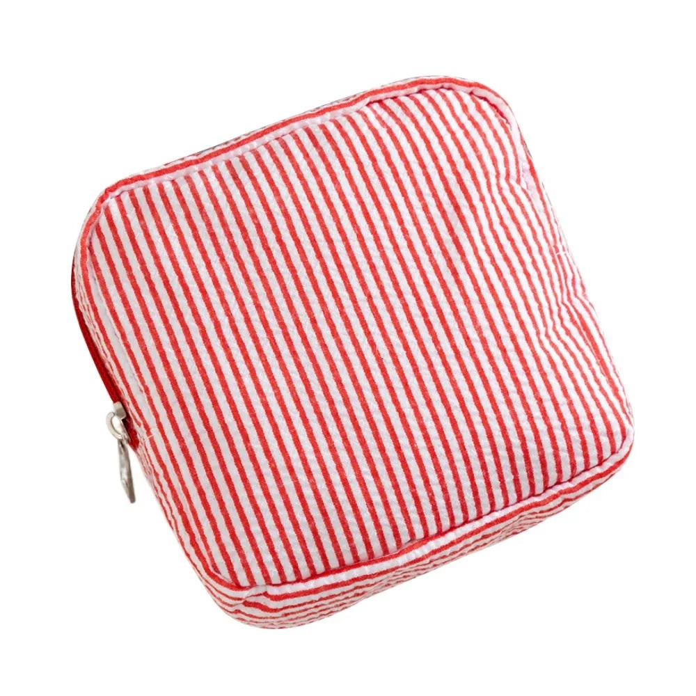 Red and white striped multi-functional storage pouch