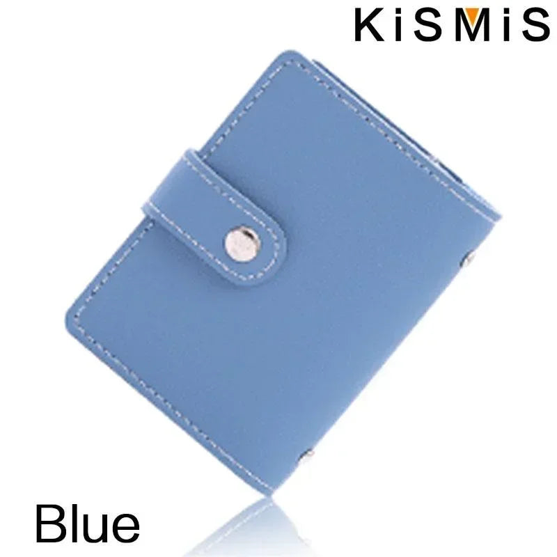 A blue slim leather card holder with a silver snap closure shown from above.
