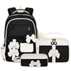A black and white nylon school backpack set for girls featuring a main backpack and a separate pouch.