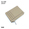 A beige genuine leather zipper card holder and coin purse.