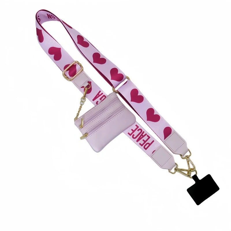 Pink lanyard with heart pattern and a detachable leather wallet for hands-free phone use