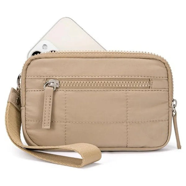 A beige quilted nylon wristlet wallet with a zipper closure and attached strap.