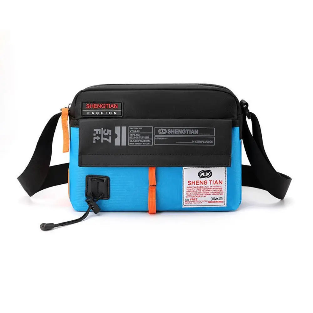 A blue waterproof nylon crossbody bag with black trim and an orange strap.