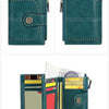 A teal leather multi-card wallet with stitching and a decorative emblem, shown in two views and open displaying various cards