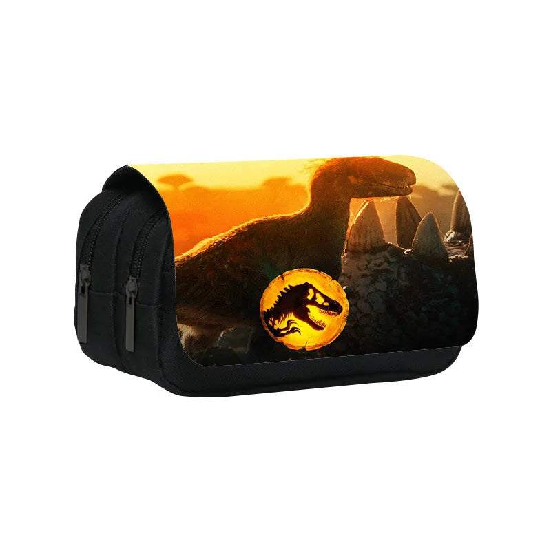 A black pencil case featuring a dinosaur silhouette against an orange sunset background.