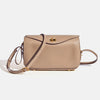 A tan genuine leather square shoulder crossbody bag with gold hardware.