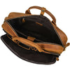 A vintage genuine leather briefcase in brown leather and dark brown fabric with brass hardware.