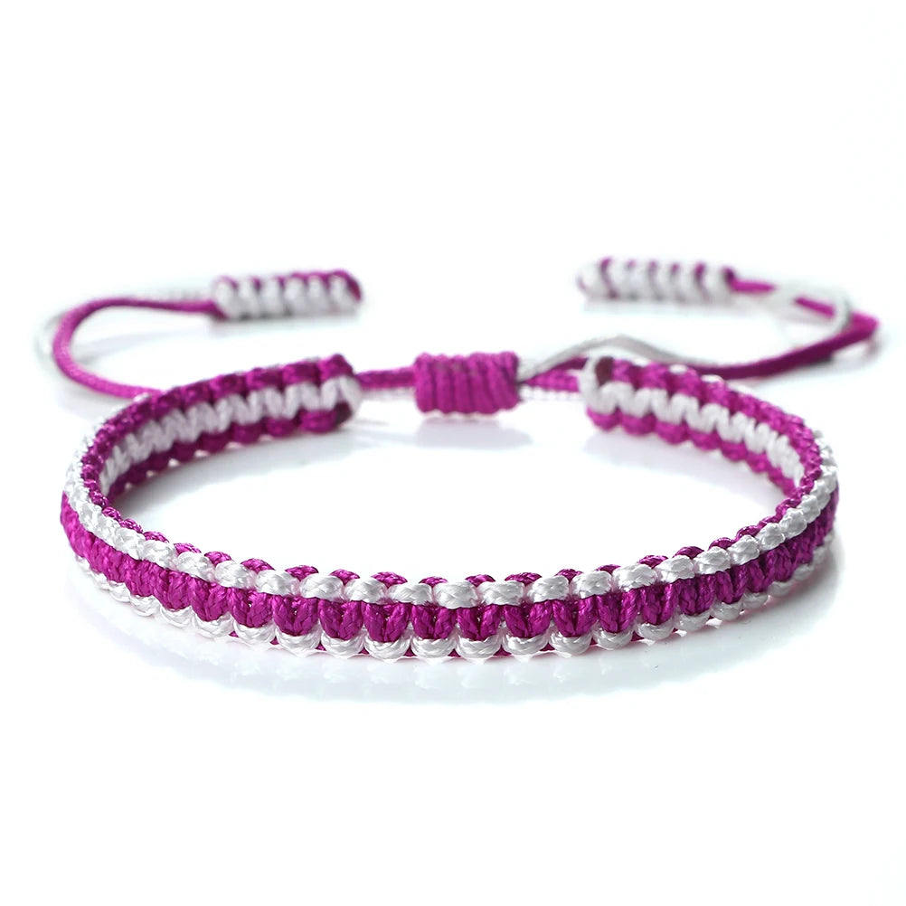 Handmade braided rope bracelet featuring pink and white threads, adjustable for a friendship gift.