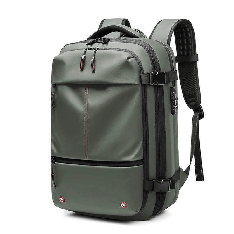 A dark olive green heavy duty laptop backpack with black straps and compression features.