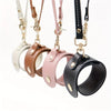 A collection of vintage leather glove holder straps in various colors including white, brown, and pink.