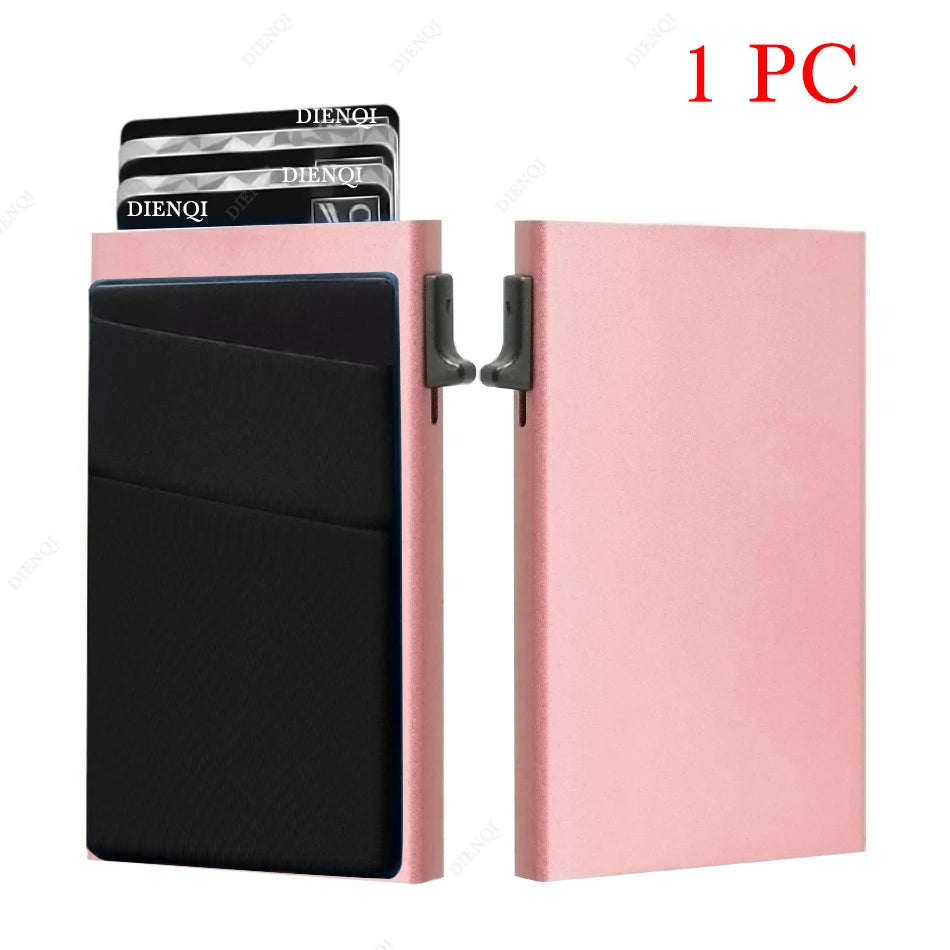 A pink card holder with a black sleeve and a metal RFID blocking card slot, showing one piece.