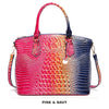 Pinkes und dunkelblaues Krokodillenmuster-Top mit Crossbody-Taschenriemen.
