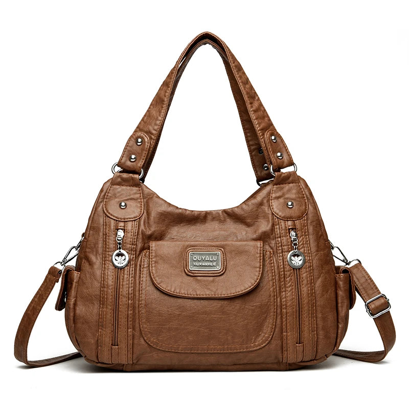 Braune Vintage Soft PU Lederhandtasche mit Klappverschluss und Lederriemen.