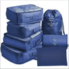 A set of seven blue fabric storage bags and a drawstring bag for travel organization.