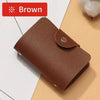 A brown premium PU leather ID and credit card wallet resting on a light background.