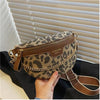 A brown leopard print crossbody shoulder bag is shown against a light background.