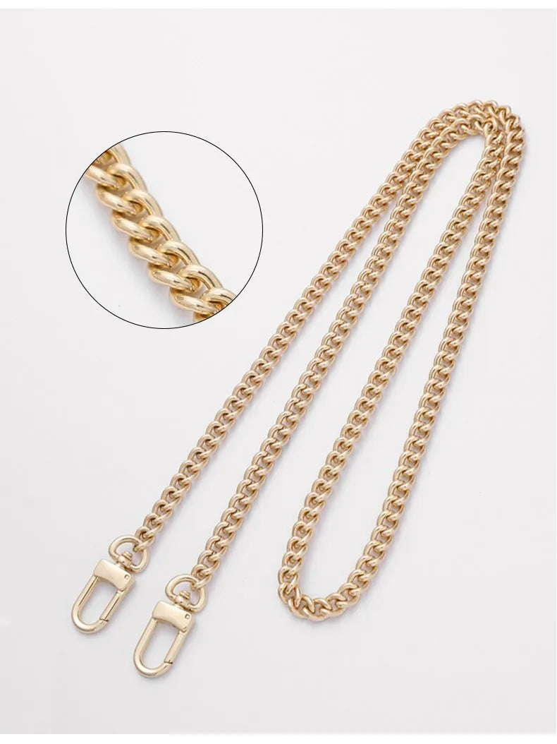 A close-up view of a gold chain strap for handbags and crossbody bags, showing the link texture.