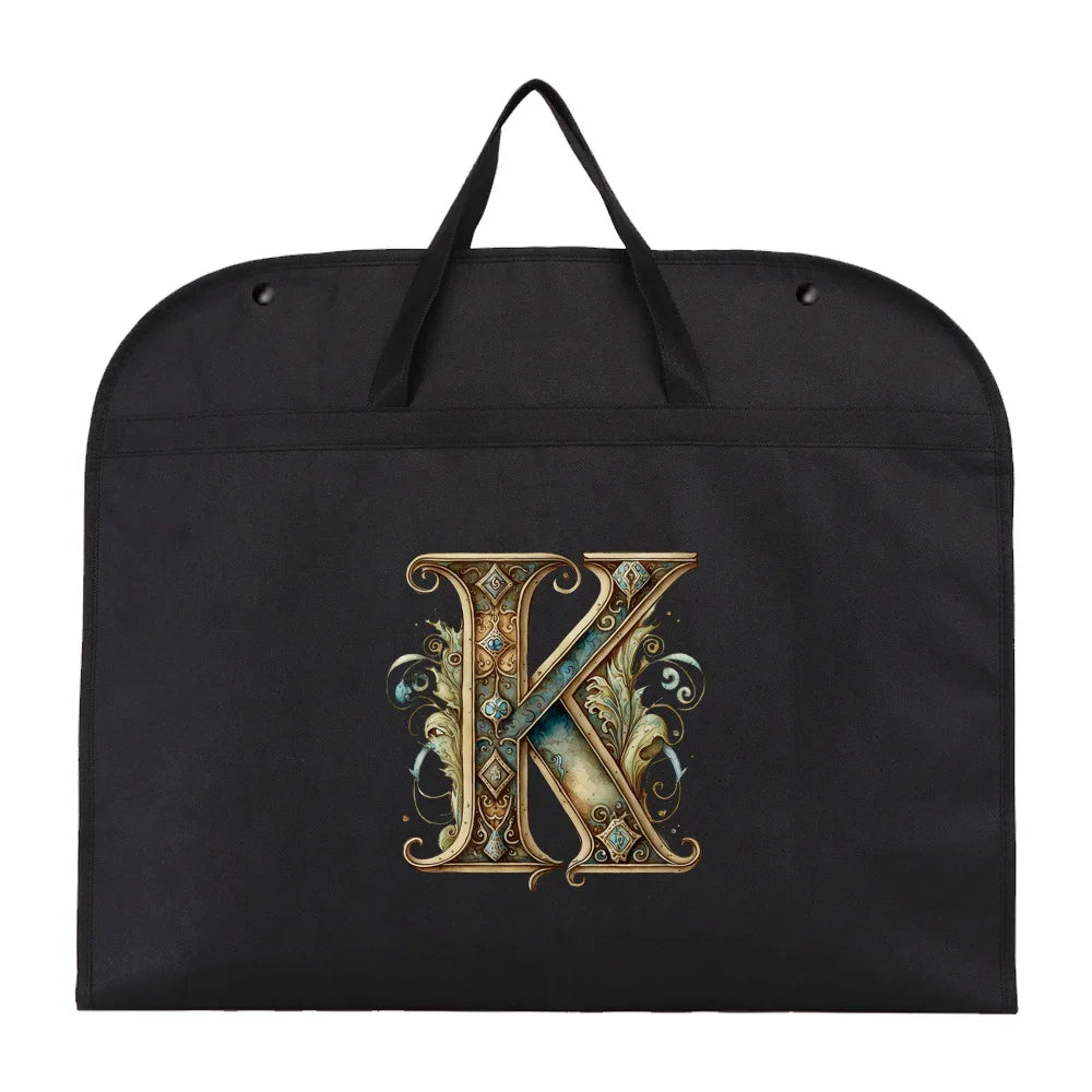 Black fabric dust cover and storage bag with a gold initial K embroidered on it.