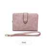 A pink women's multi-slot frosted card wallet with a leather strap.
