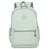 A light mint green durable nylon commuter backpack with a gray strap and diamond-shaped logo.