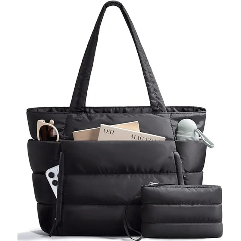 A black quilted multi-compartment tote bag with a handle shown from the front.