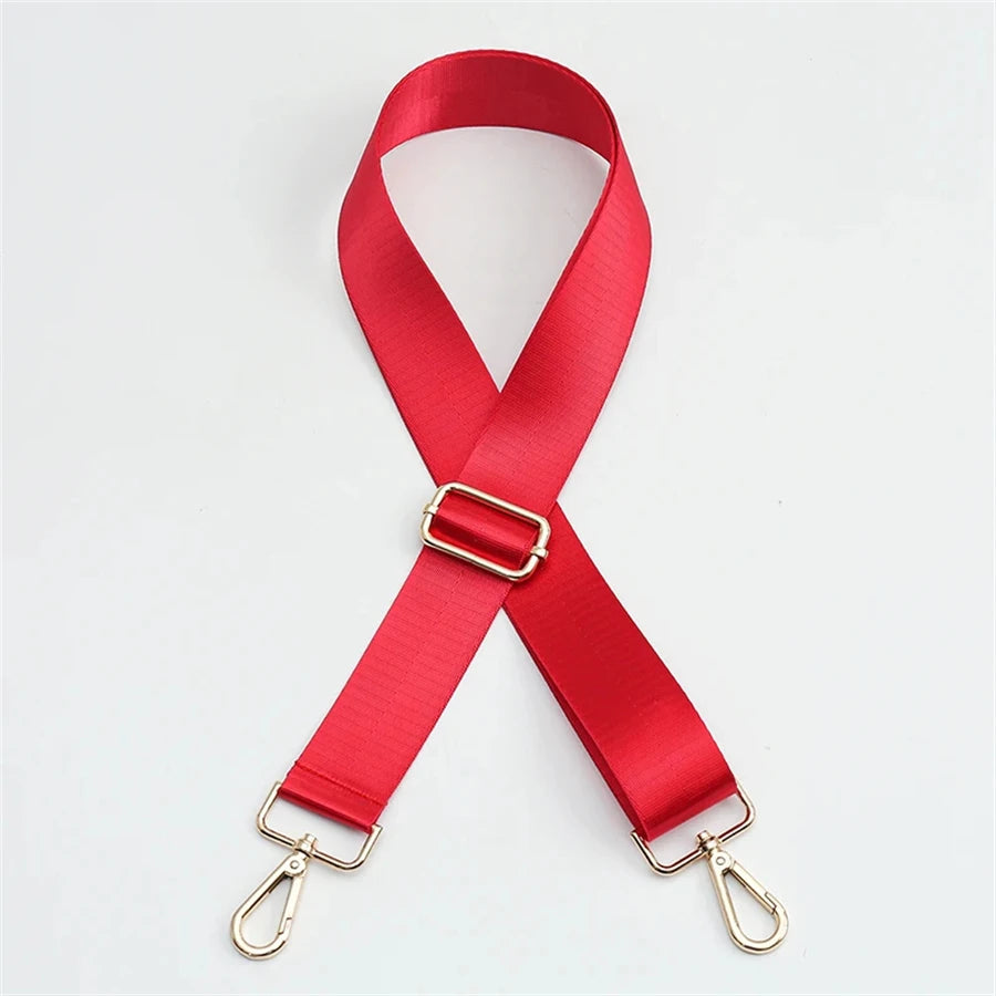 A bright red adjustable nylon shoulder strap with metal clasps.