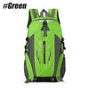A bright green waterproof hiking backpack with black accents and gray straps.