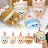 A collection of fluffy bread-shaped plush keychains in various colors and stripes.
