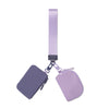 A purple mini nylon zipper wristlet pouch for coins and essentials.