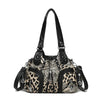 A black PU leather tote bag with an adjustable strap featuring a leopard print design.