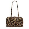 A leopard print nylon shoulder tote bag with a long strap.